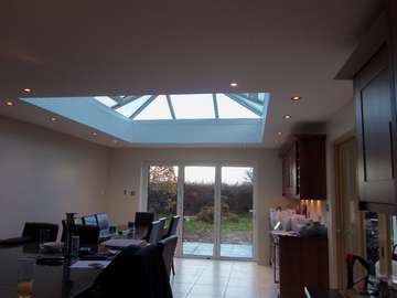 Mr & Mrs K. Greasby Wirral. : Installation of Centor C1 Aluminium Bi Fold doors, Triple glazed with 44mm sealed units U value .75 Marine Finish Polyester Powder Coated. K2 PvcU Capped Aluminium Rooflight glazed with Celcius Clear U Value 1